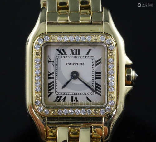 A lady's modern 18ct gold and diamond Cartier Panthere quartz wrist watch, with Roman dial and