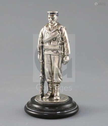 A late Victorian novelty silver and enamel inkwell, modelled as a sailor from HMS Duke of