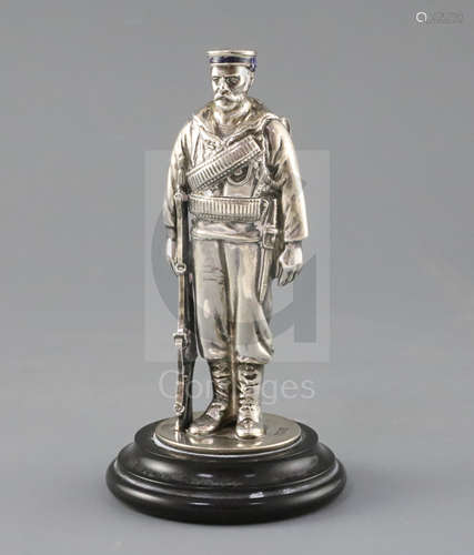 A late Victorian novelty silver and enamel inkwell, modelled as a sailor from HMS Duke of