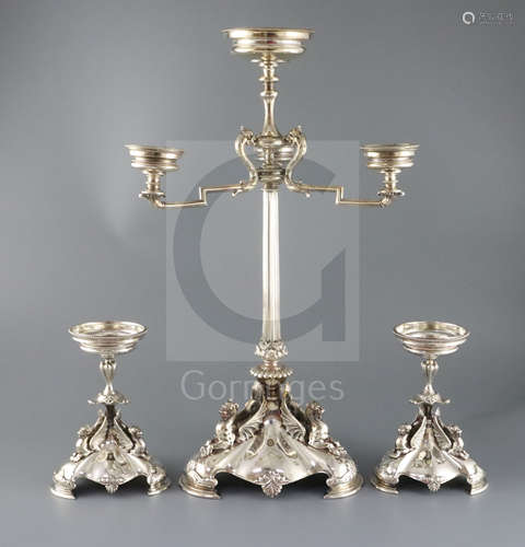 A Victorian electroplated three-piece table garniture by Elkington & Co. (lacking glass bowls),