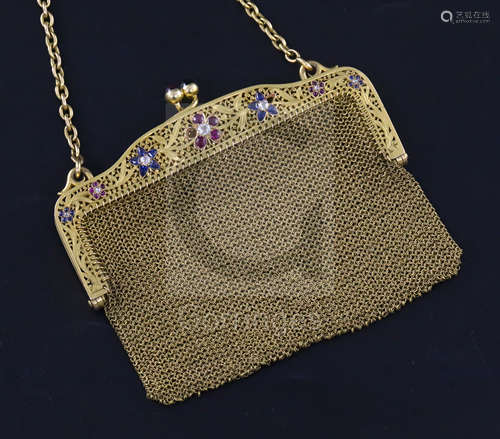 A French pierced 18ct gold, ruby, sapphire and diamond mesh evening purse, set with gem set floral