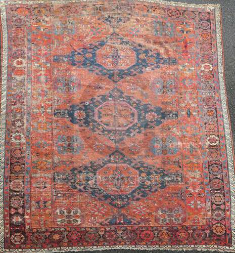 A Soumak red ground carpet, with octagons in a field of geometric motifs and four row border(