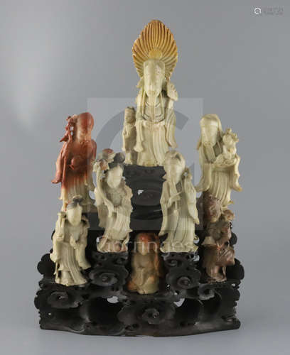 A Chinese soapstone group of eight immortals, late 19th / early 20th century, each separate figure