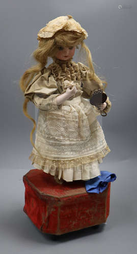 A Roullet et Decamps 'lady with powder puff and mirror' automaton with a closed mouth Jumeau head,