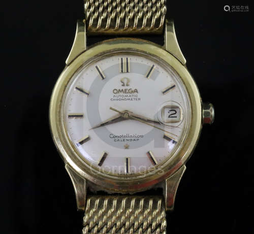 A gentleman's early 1960's 18ct gold Omega Constellation Calendar automatic wrist watch, with