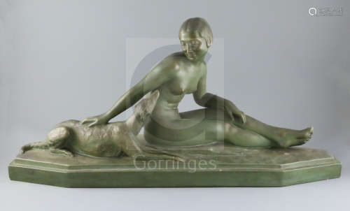 Luce. An Art Deco bronzed terracotta group of a seated nude maiden and hound, signed, W.31in.