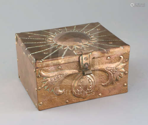John Pearson. An Arts & Crafts Newlyn copper casket, with sunflower decorated lid and stylised