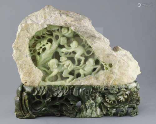 A Chinese bowenite jade boulder carving of monkeys clambering through a pine tree, 20th century,