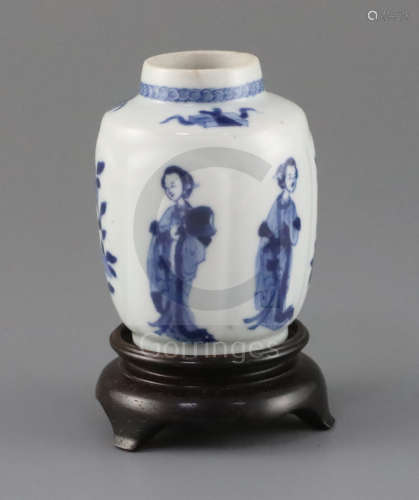 A Chinese blue and white small jar, Kangxi period, painted to the petal lobed body with ladies and