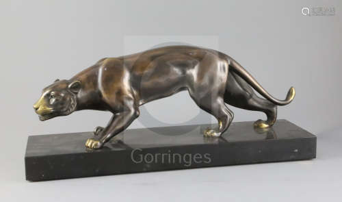 J. Brault. A French Art Deco bronze model of a stalking panther, on black marble plinth, W.19.5in.