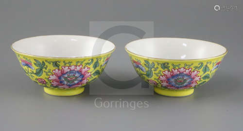 A pair of Chinese yellow ground famille rose bowls, Daoguang six character seal mark and probably of