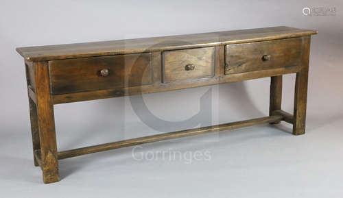 A late 18th century oak dresser base, fitted three long drawers, on stile feet with H stretcher W.