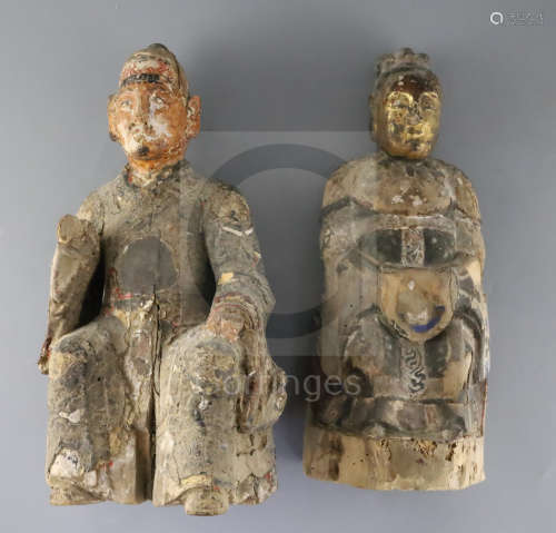 Two Chinese polychrome and gilt lacquered wood figures of immortals, 17th - 18th century, the