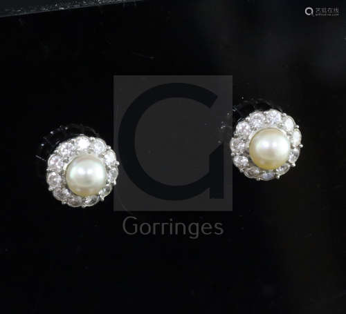 A pair of mid 20th century white and yellow gold, cultured pearl and diamond set circular cluster