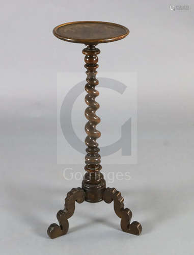 A late 17th century Dutch walnut candle stand, with floral marquetry decorated top and barley