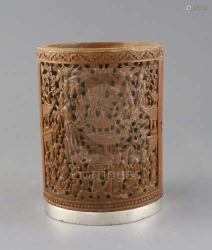 A Chinese bamboo brush pot, 19th century, carved in high relief with a large rectangular panel of