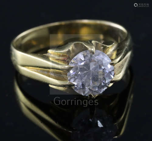 An 18ct gold claw set solitaire diamond ring, the round cut stone weighing approximately 2.10cts,