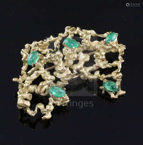 A 1960's/1970's French 18ct gold and cabochon emerald modernist brooch, set with five graduated