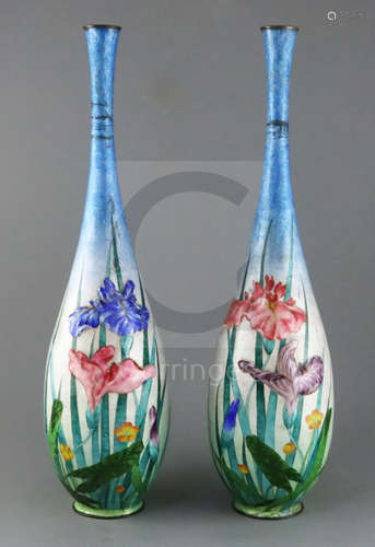 A pair of large Japanese ginbari cloisonne enamel bottle vases, c.1910, each decorated in silver