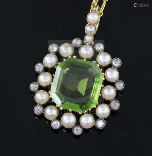 A late Victorian gold and silver, peridot, split pearl and diamond set pendant, in fitted gilt