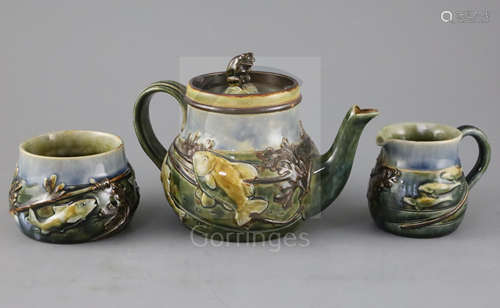 A Royal Doulton 'fish and pond weed' three-piece tea set, designed by George Tinworth, made c.