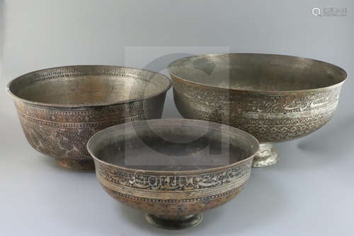 An 18th/19th century Persian tinned copper bowl, with inscribed and foliate decorated bands,