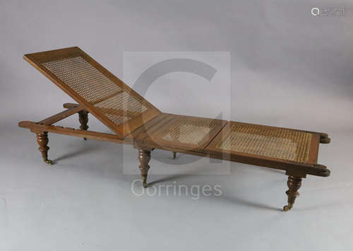 An early 19th century oak folding campaign day bed, the underside bearing a paper label - ''From