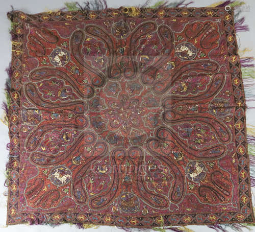 A 19th century Kashmiri handwoven silk shawl, woven with a design of figures, some on horseback,