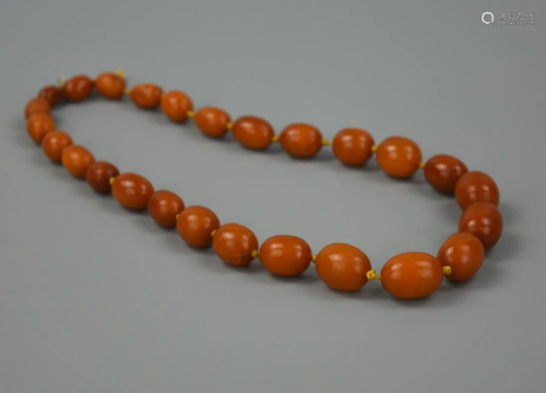 A Chinese 27 Beed Beeswax Necklace