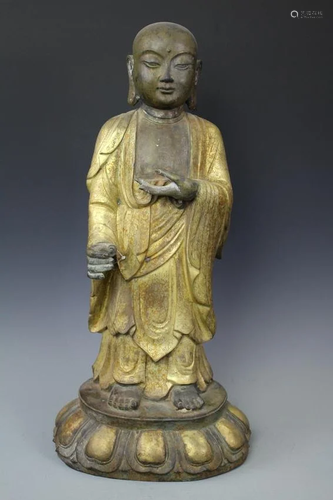 A Bronze Figure Of Buddha