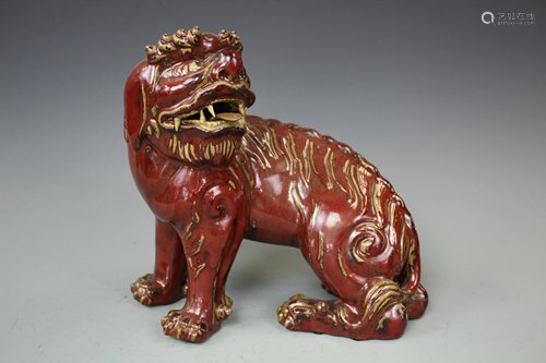 A Copper-Red Gilt Glazed Figure of Lion