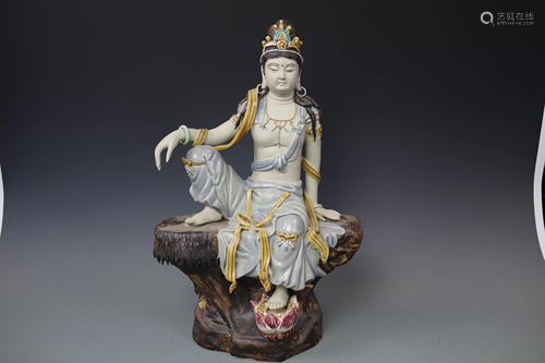 A Tri-Colour Porcelain Figure of Guanyin