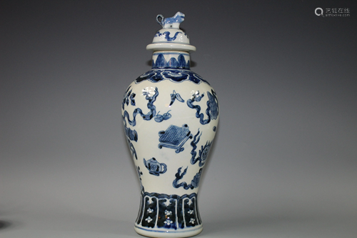 A Blue and White Jar With Mythical Beast Carved C…