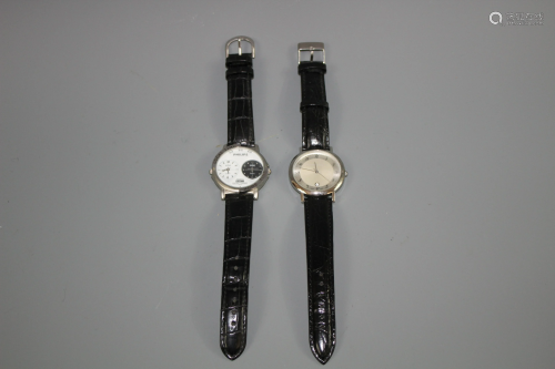 A Pair of Stainless Steel Watches 