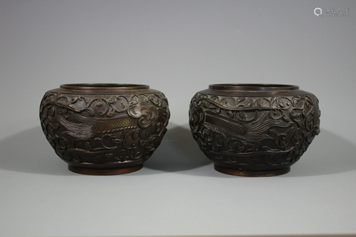 A Pair Of Bronze Engraved 