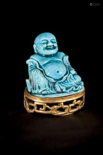 Le sage putaï assis en délassement en porcelaine à glaçure monochrome turquoise [...]