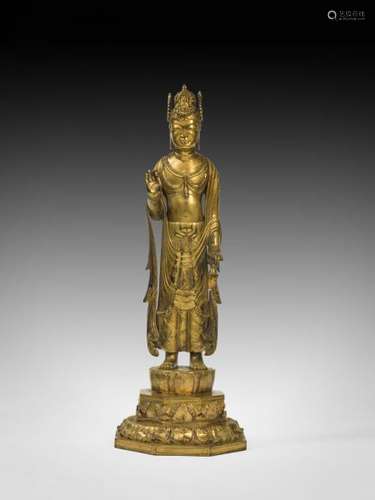 Lokeshvara vêtu d'une robe monastique utarasanga debout sur un haut tertre lotiforme [...]