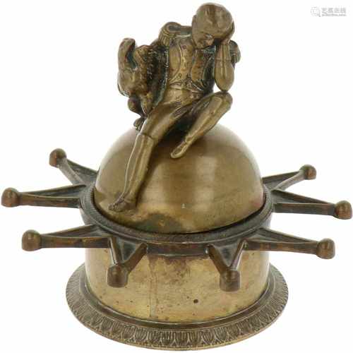 An inkwell mount with a figure of a defeated Napoleon. 19th century.