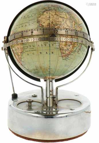 A table globe clock, electric wired. Germany, First half 20th century.