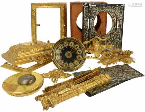 An elaboratly embellished firegilt carriage clock. Dismantled.