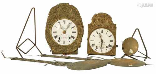 A lot with (2) comtoise clocks incomplete. In need of restoration work.