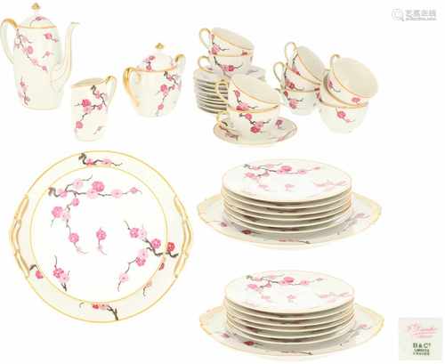 A 26-piece part porcelain dinner service decorated with flowers, marked Limoges. France, 20th