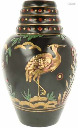 An earthenware vase decorated with herons in a landscape, signed St. Ghislain. Belgium, 20th