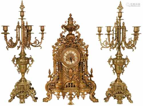 A 3-piece bronze mantlepiece set. Circa 1900.