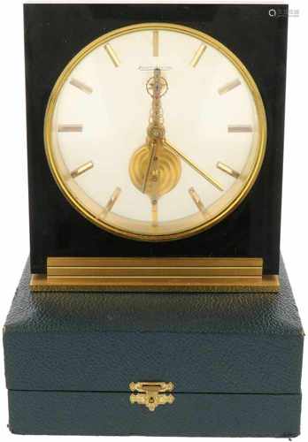 A Jaeger le Coultre skeleton desk clock in original box. 20th century.