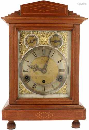 A 'Kienzle Uhren' table clock. Produced for the English market, with pendulum and melody. Ca.