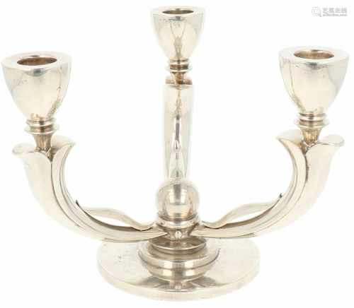 Silver table candlestick.