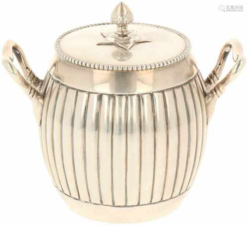 Silver sugar canister.