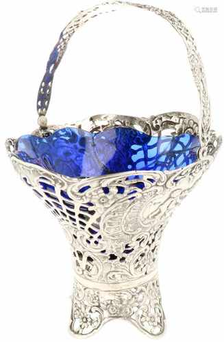 Silver table basket with swing handle.