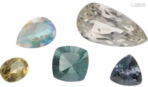 Lot of natural multicolour topaz, heliodor, tanzanite, hiddenite and fluorite.